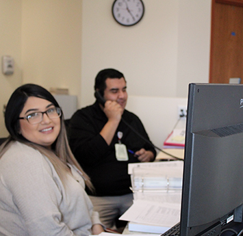 Brianna and Arturo working at the clinic